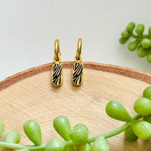 Stainless Steel Hoop Earrings with Zebra Print Tag – Gold